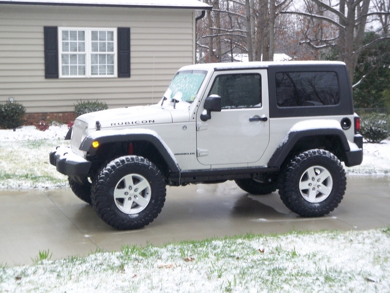 How big are stock jeep tires