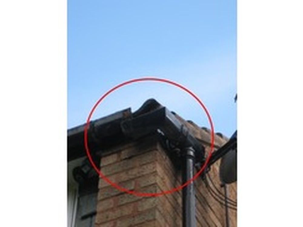 Gable end roof tile edge recementing & gutter repair Roofing job in