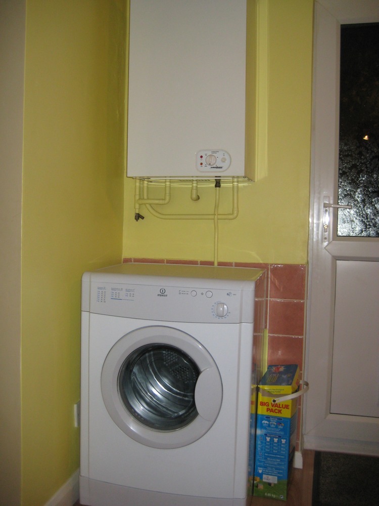 Box in tumble dryer and boiler in kitchen Carpentry & Joinery job in