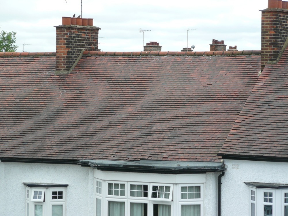 Strengthen and repair roof slope bowing Roofing job in Wanstead, East