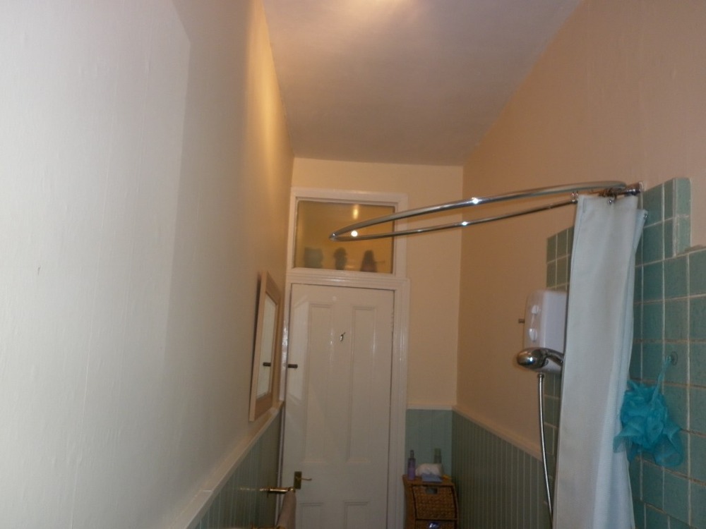 Skim Walls of a Tenement bathroom Plastering job in Glasgow