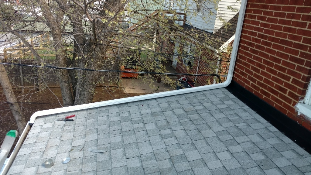 Downspout Extensions Connect Upper Gutters to Lower Gutters