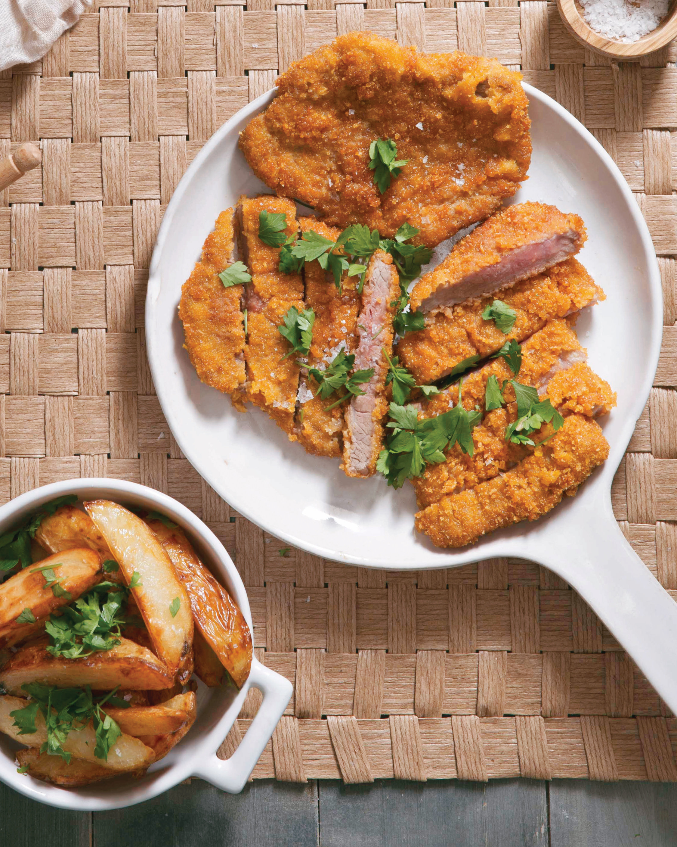 Budgetfriendly beef schnitzel with potato wedges MyKitchen