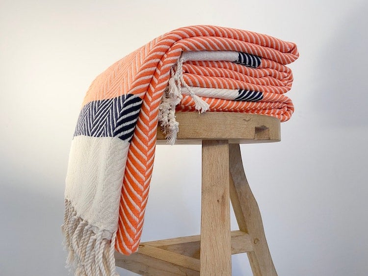 20 Cool Throw Blankets To Keep You Warm (and Stylish)