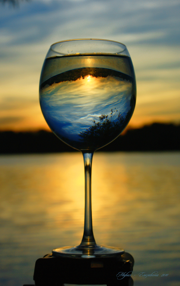 Inverted Reflections Of Beautiful Landscapes On Glassware
