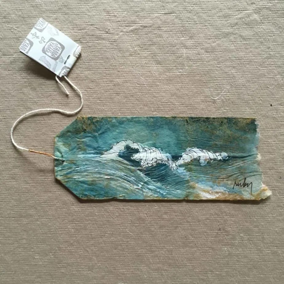 Artist turns used tea bags into mini art works