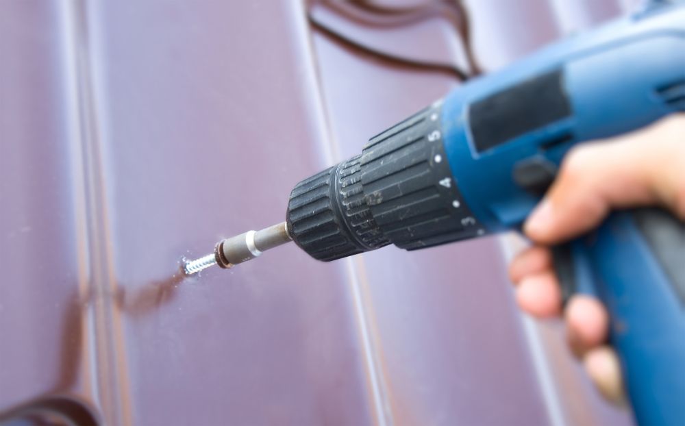 How To Screw Down Metal Roofing? (2022)