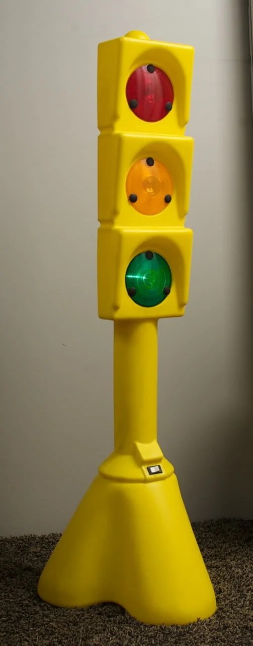 Traffic light toys, old and new, for little kids and big.