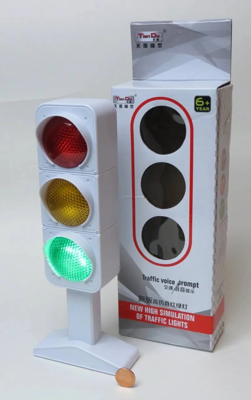 Traffic light toys, old and new, for little kids and big.