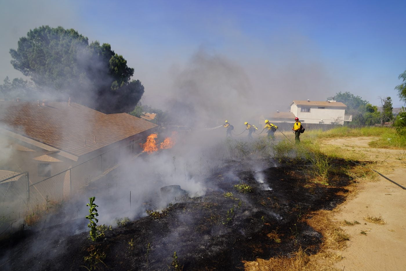 Wildfire erupts west of Lake Elsinore, blackening hillside Valley News