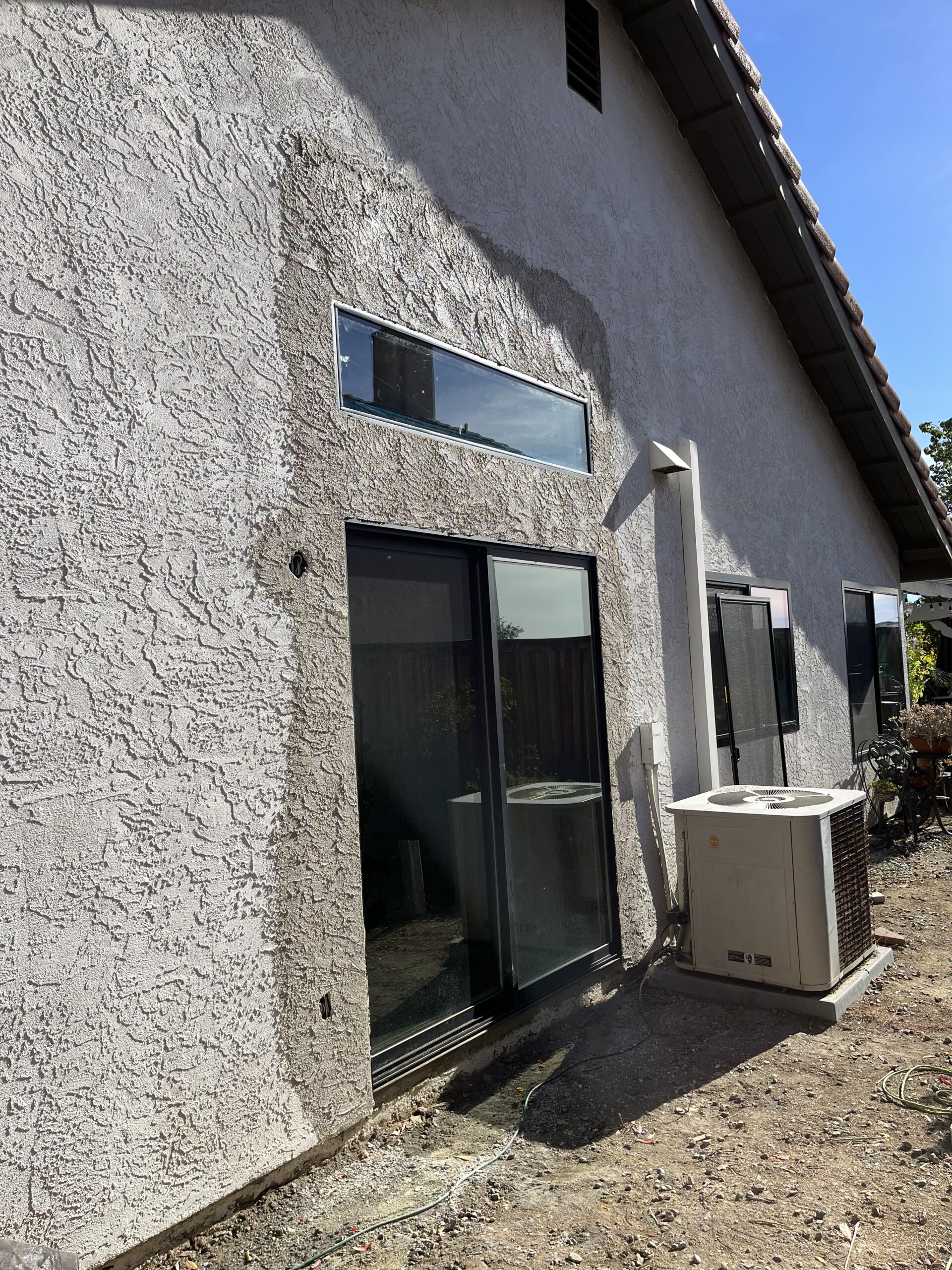 Stucco Repair around Door (before & after)