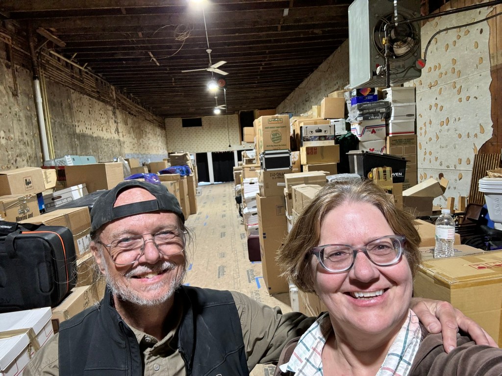 The Smiths with boxes in their building