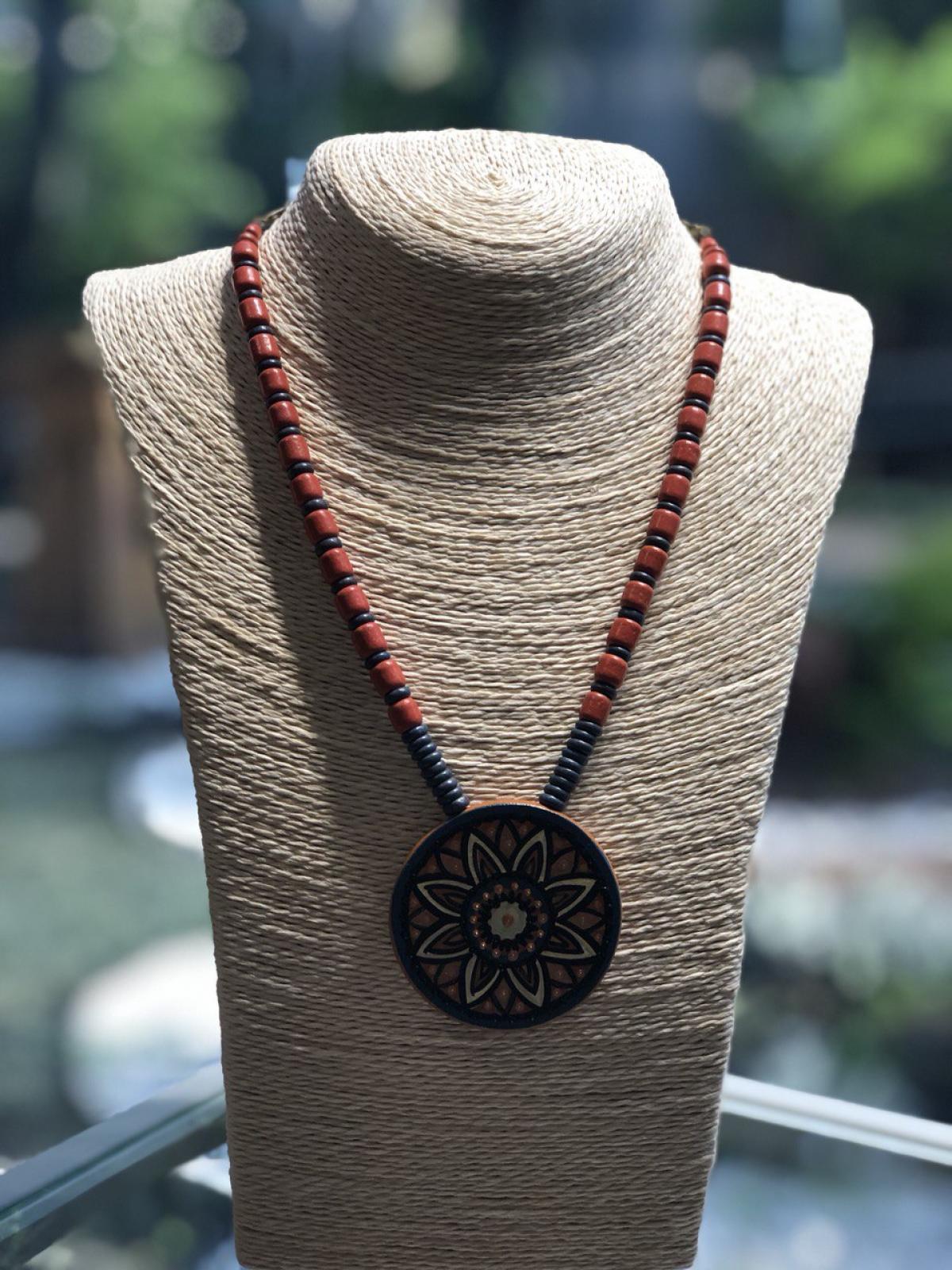 Ceramic necklace, flower medallion