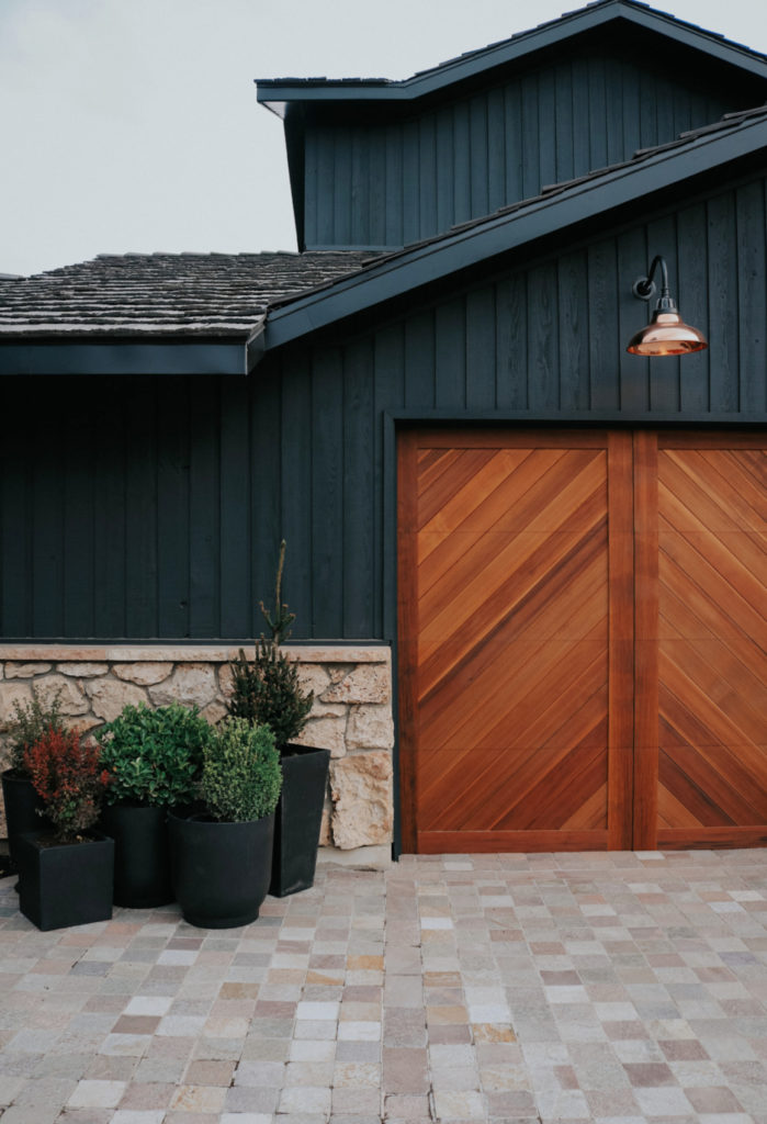 Wood Garage Doors and Copper Exterior Lights Over Doors Nesting With