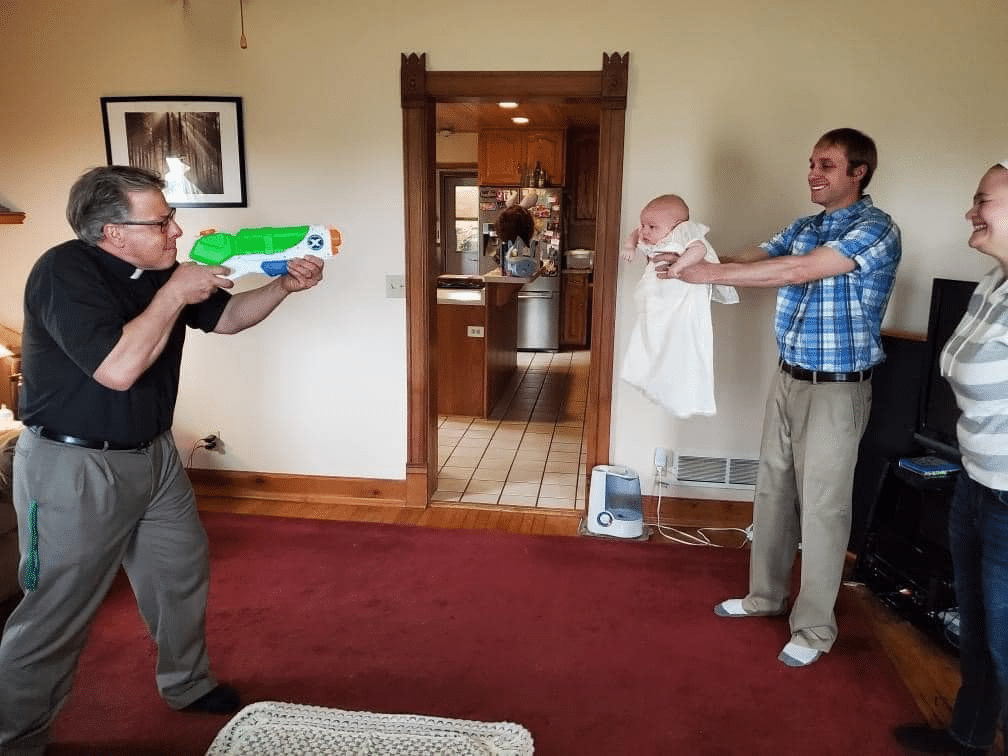 Meme Generator Priest baptizing baby with water gun Newfa Stuff