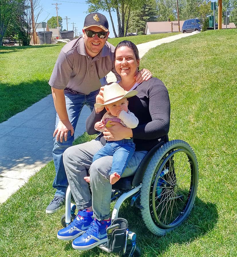 Little Boy In Wheelchair With Mom