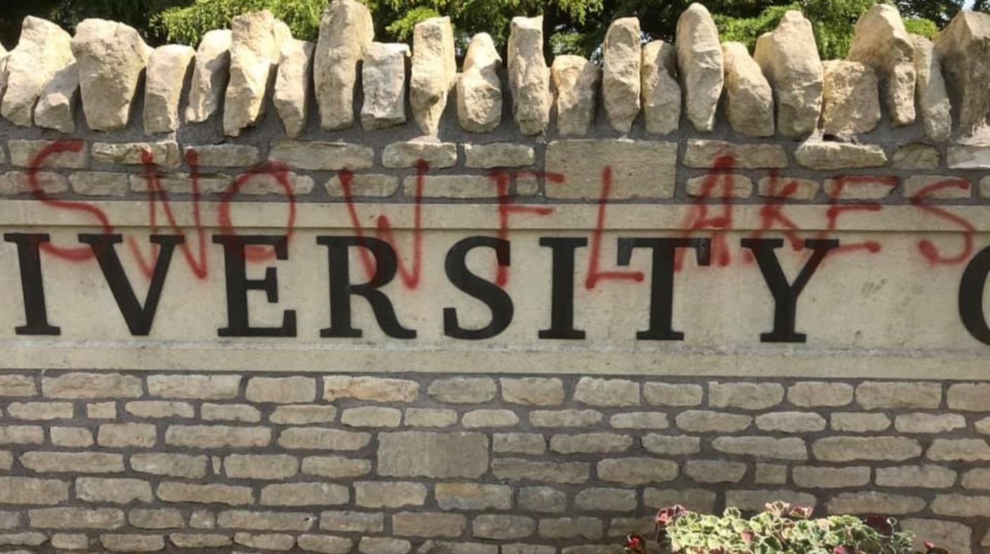 Vandals graffiti the word 'snowflakes' across University
