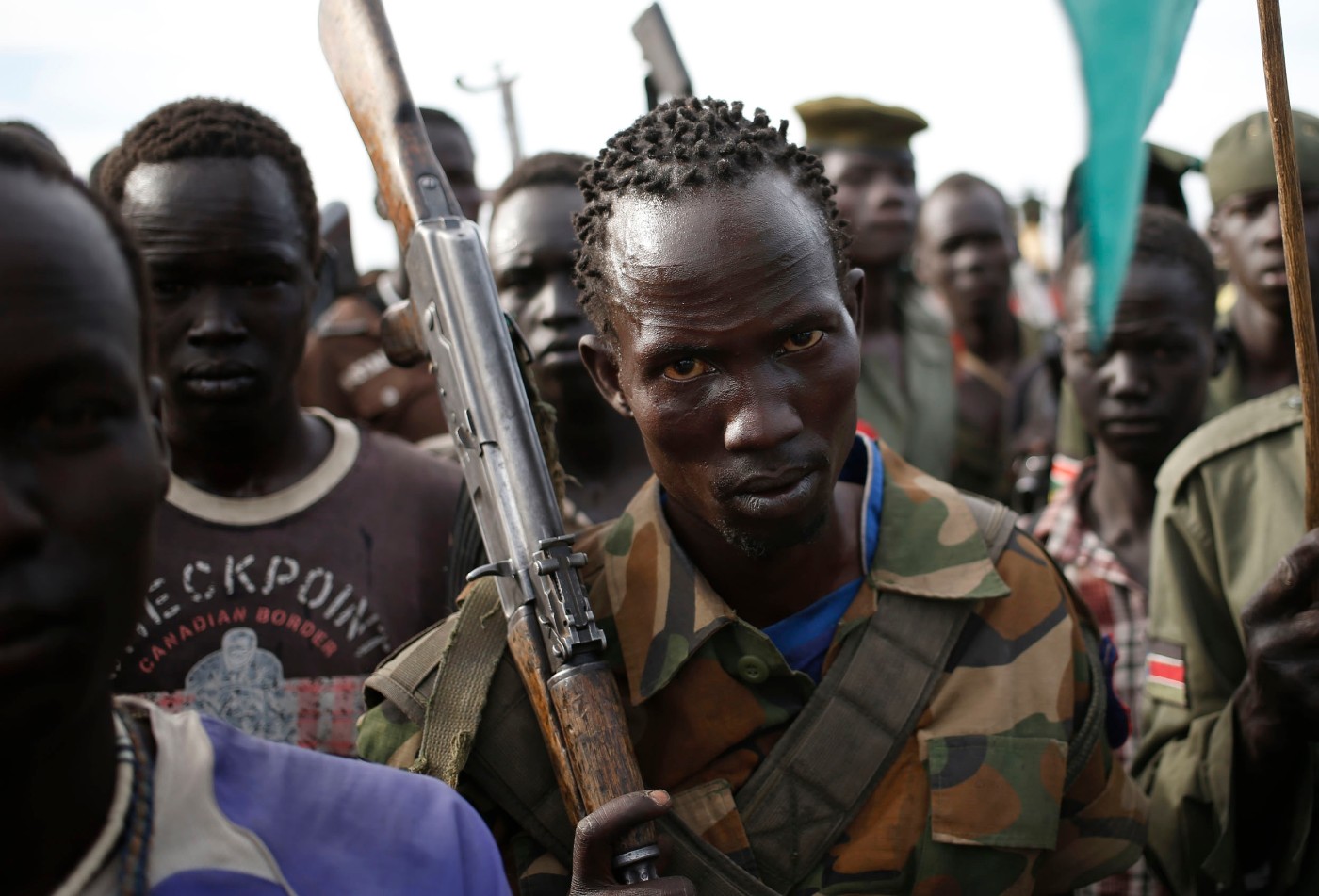 Jikany Nuer White Army fighters hold their rifles as they walk in a
