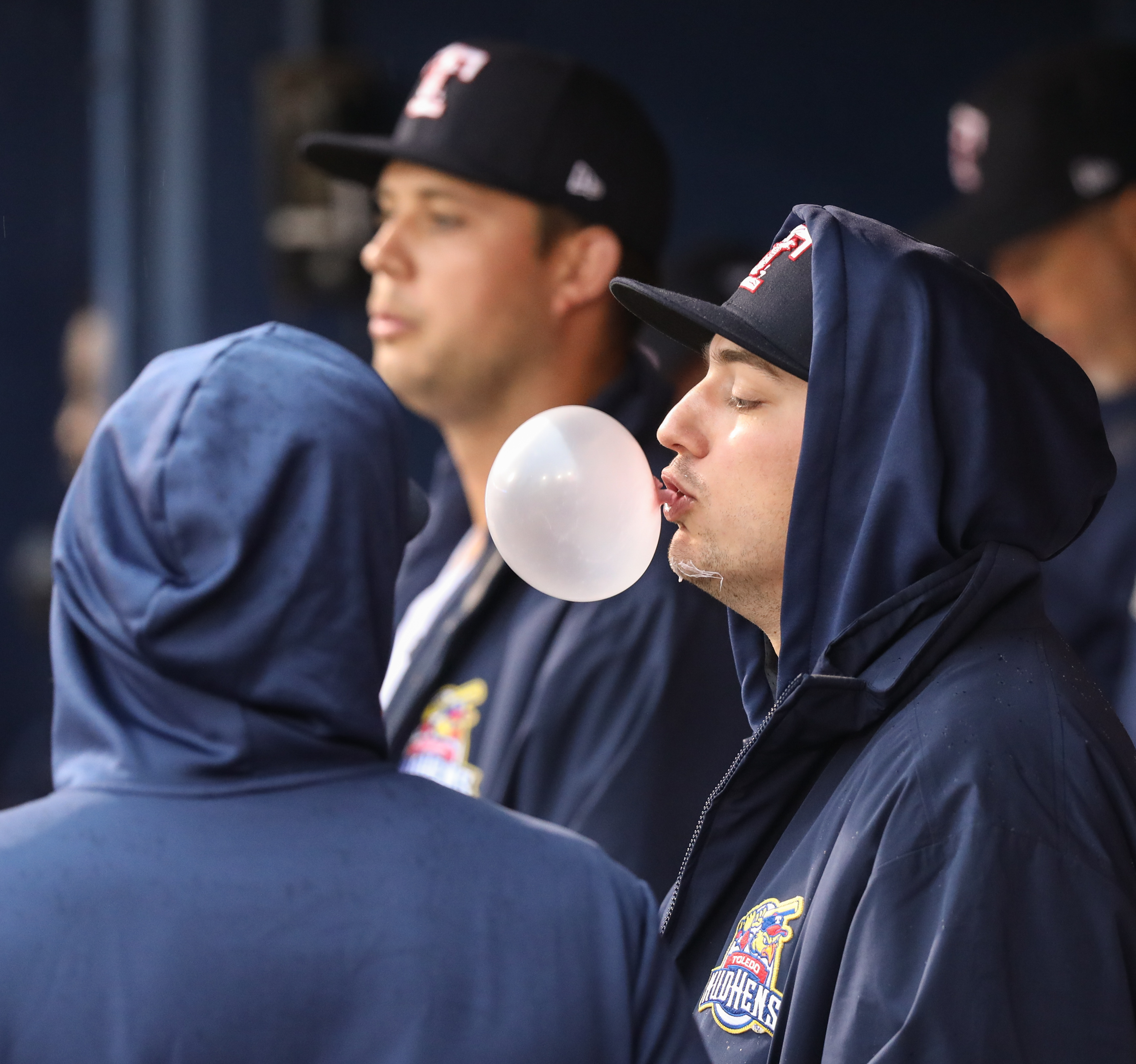 Toledo Mud Hens pitcher John Schreiber blows bubble sin the dugout during a baseball game agains the Columbus Clippers Thursday, May 3, 2019, at Fifth Third Field in Toledo, Ohio. THE BLADE/JEREMY WADSWORTH