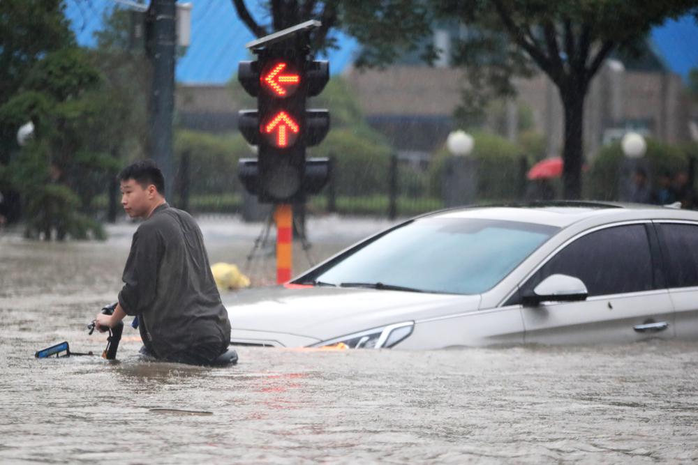China blasts dam to divert floods that killed at least 25 Newsworthy