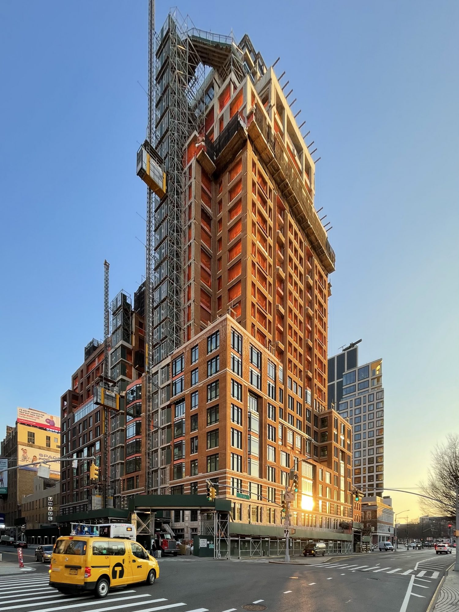 The Cortland's Red Brick Façade Continues Progress at 555 West 22nd