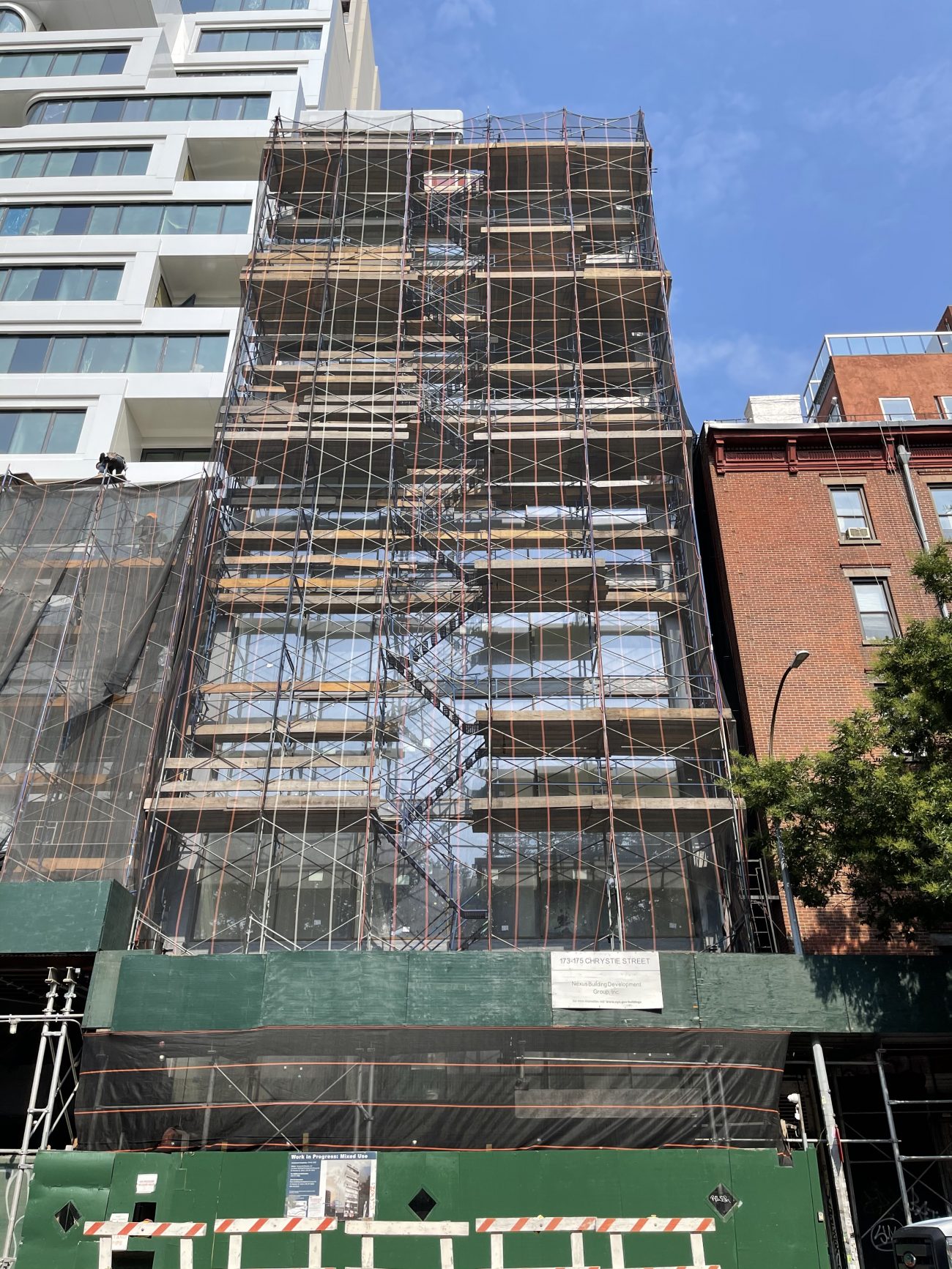 173175 Chrystie Street Progresses Behind Scaffolding on Manhattan's