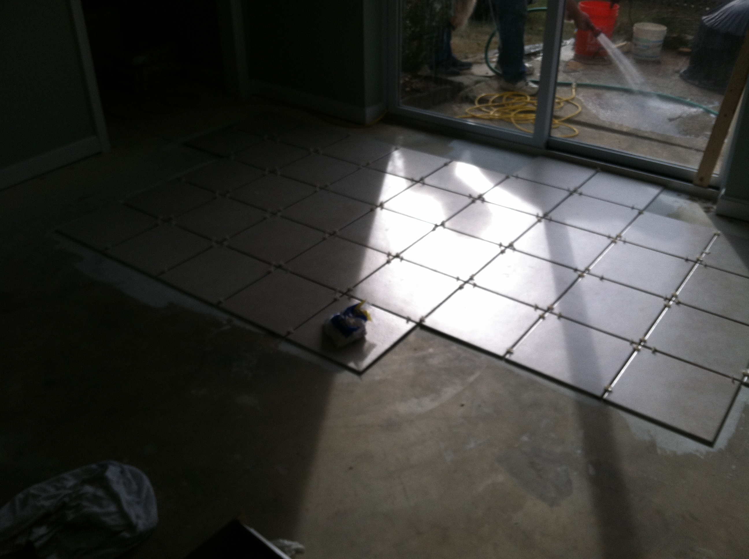 Getting Started Tiling Your Concrete Floor Next Day Dumpsters