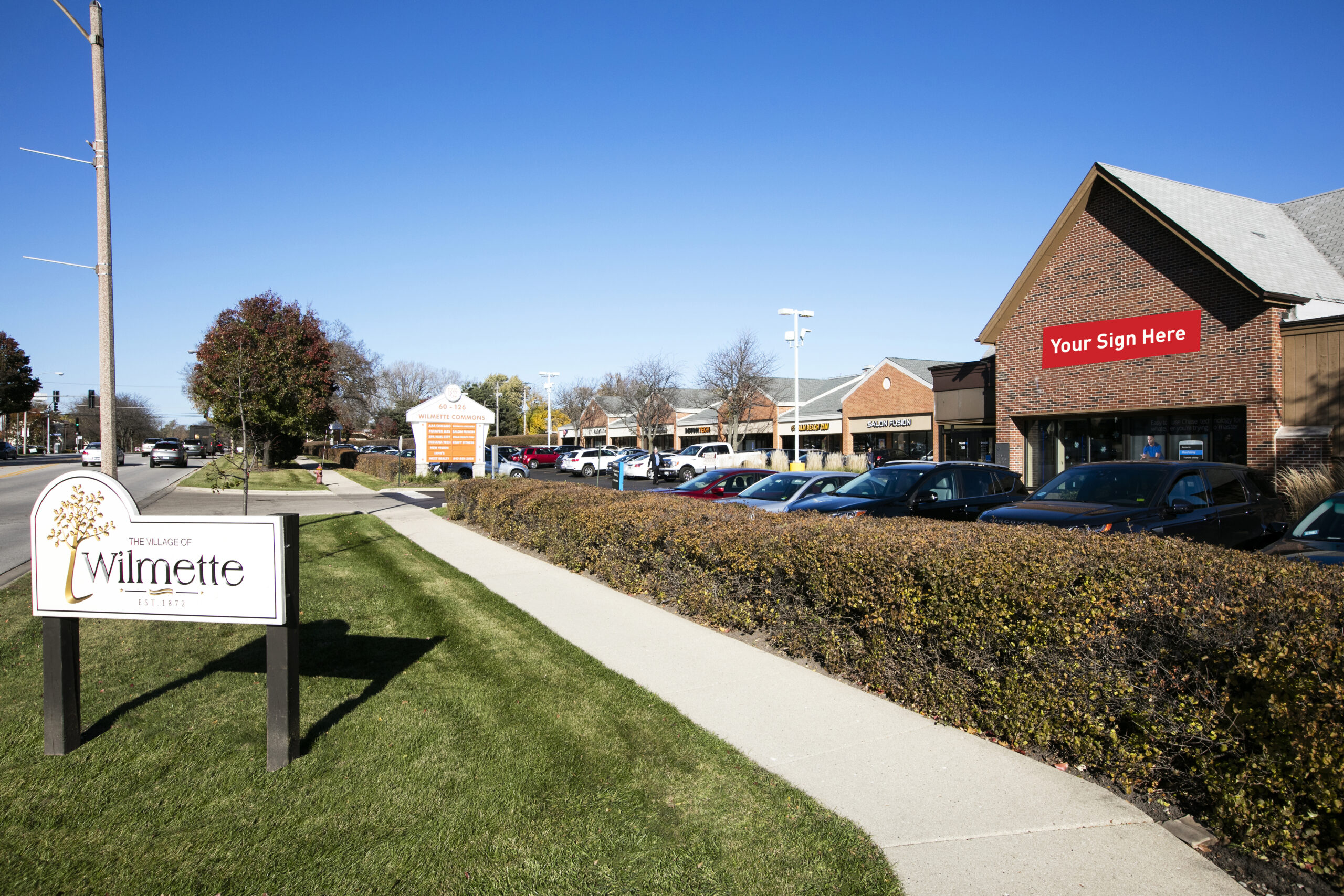 pathway with sign Next Realty