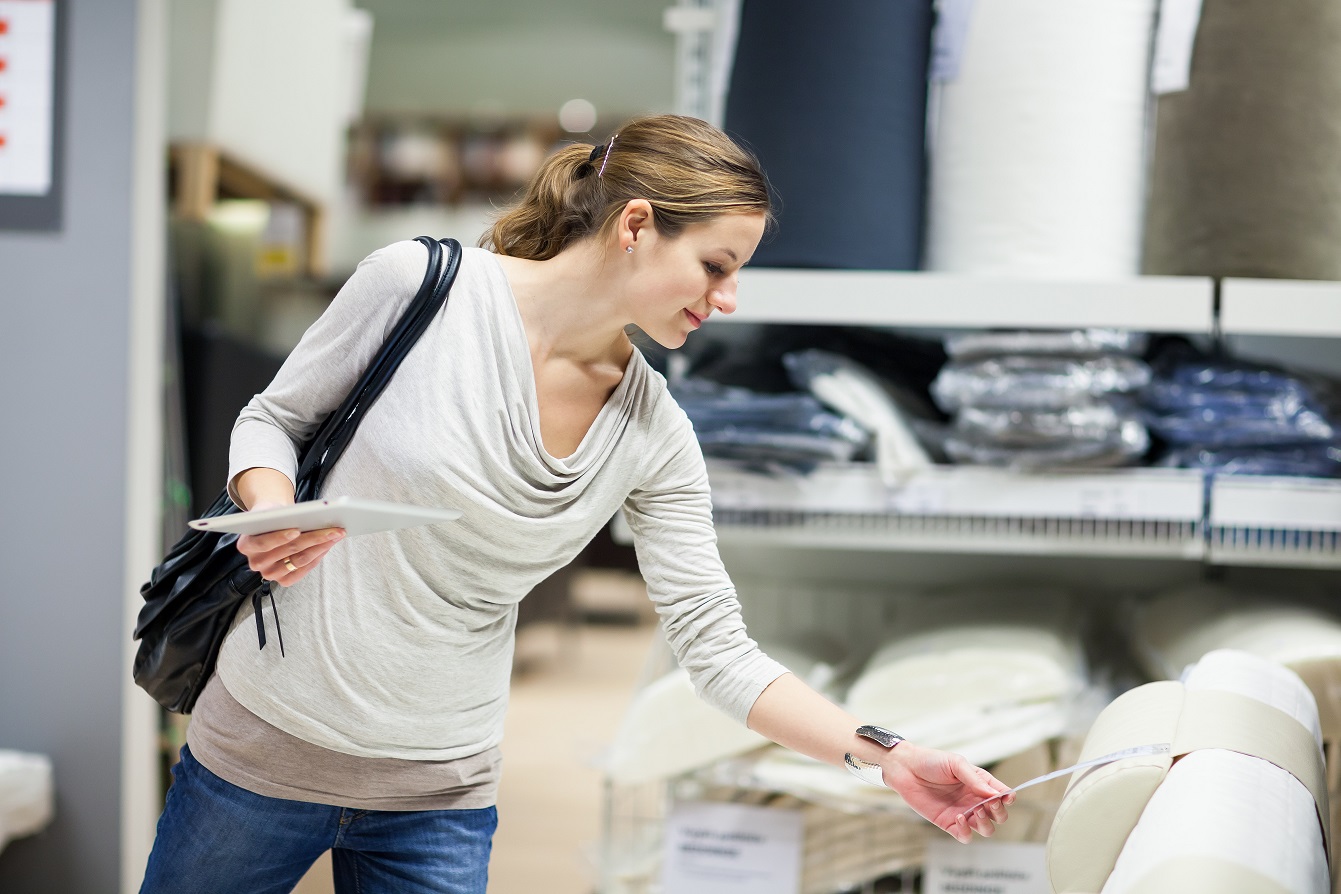 Young woman shopping for furniture in a furniture store National