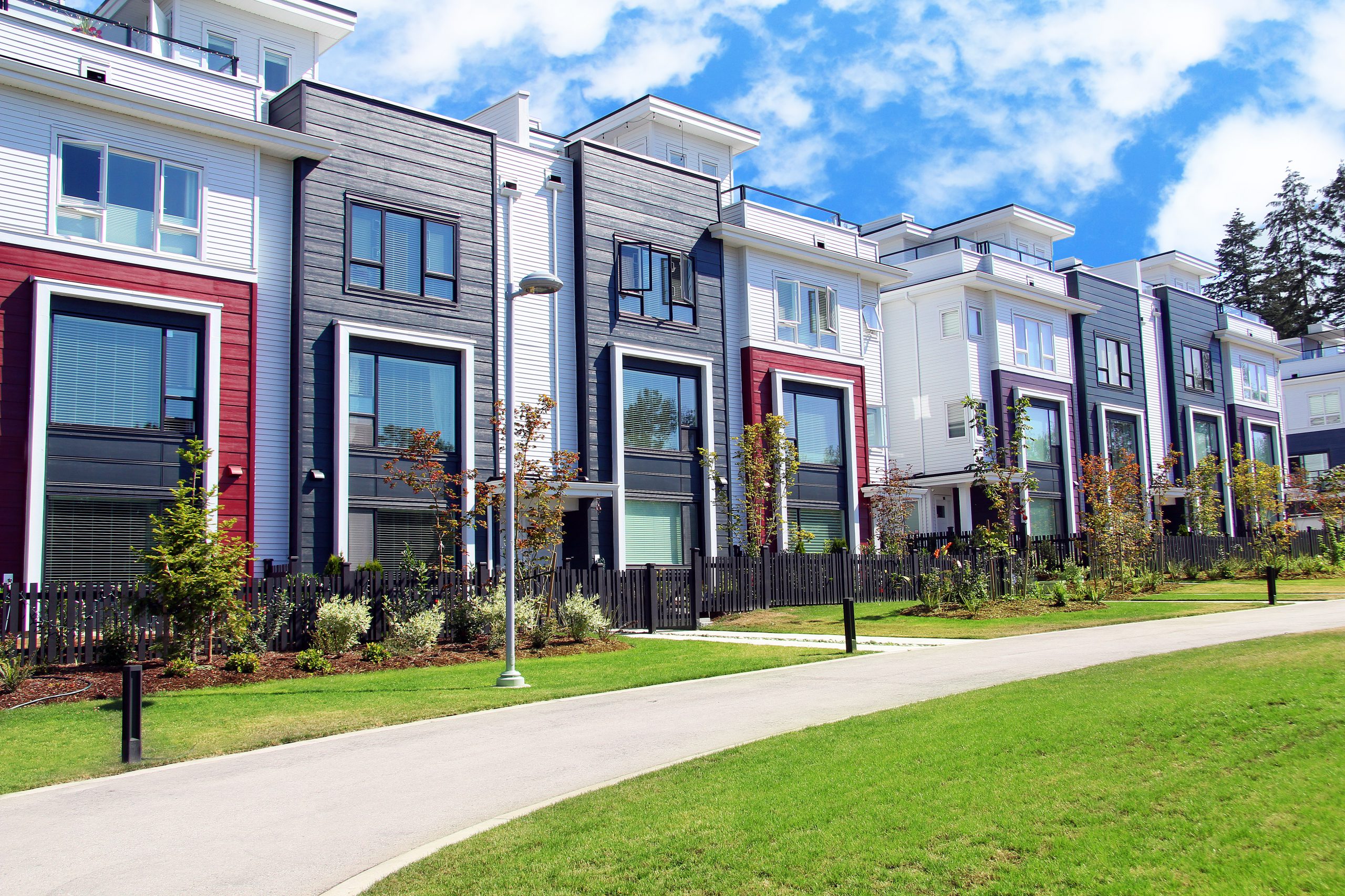 Beautiful new contempory suburban attached townhomes with colorful