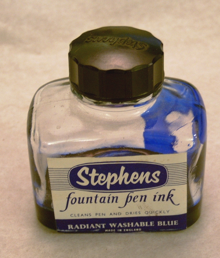 Stephens fountain pen ink bottle for radiant washable blue ink. Black plastic screw on lid with