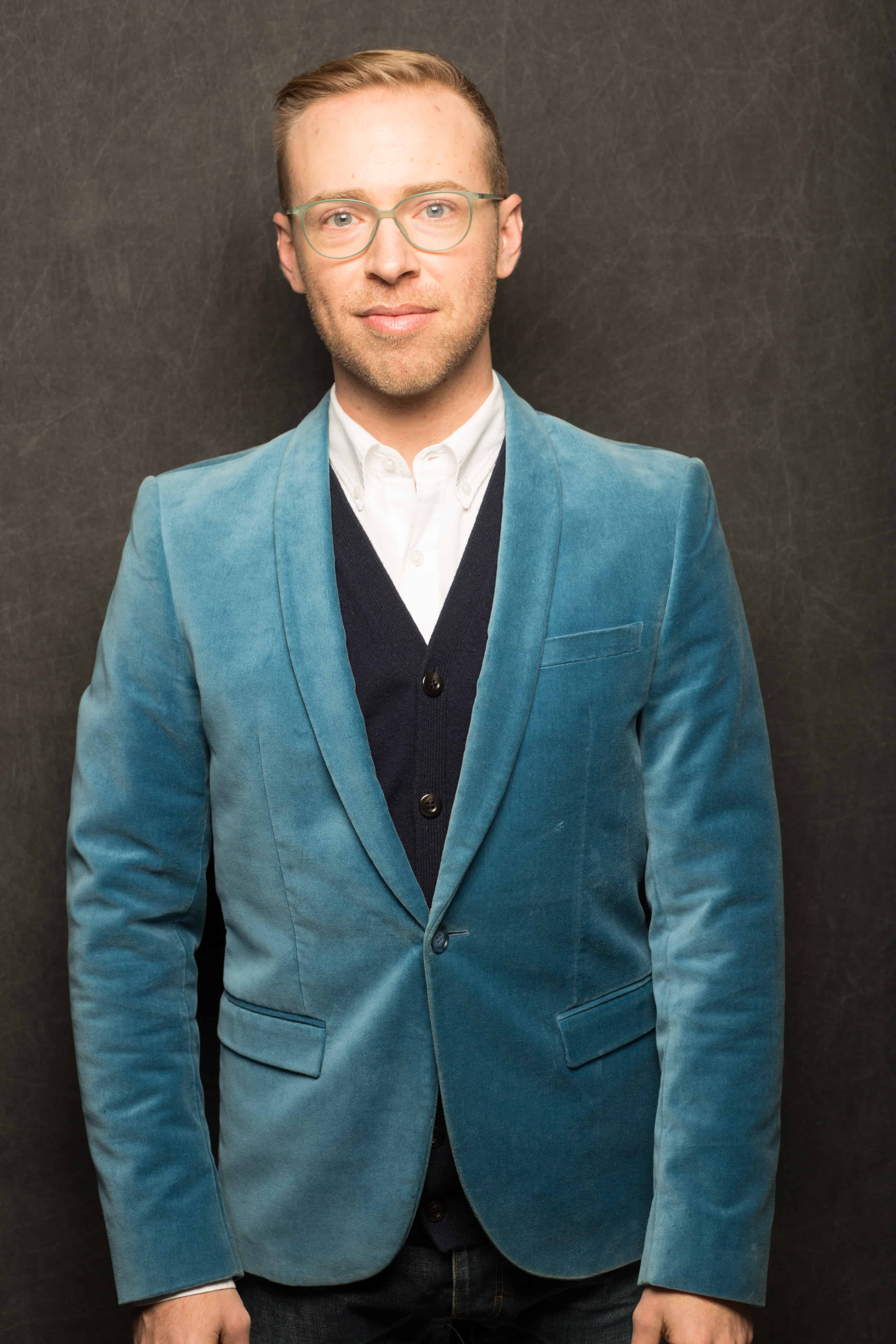 Headshots of Nick Gray