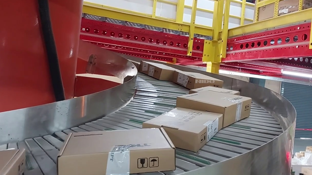 Vertical Material Transport, Barcode Scanning & Sorting Nido Automation