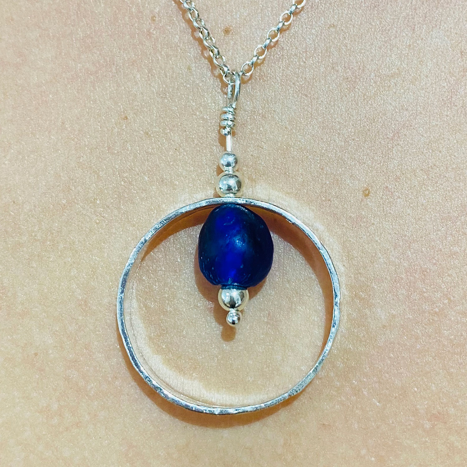 Hammered hoop necklace with internal bead Nikki Murrish Handmade