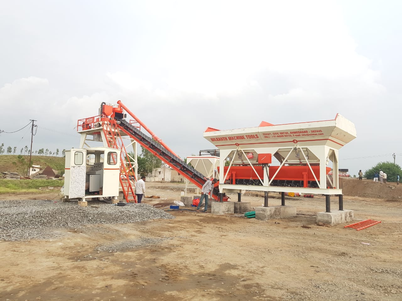 Stationary Pan mixer type concrete batching plant Nilkanth Machine