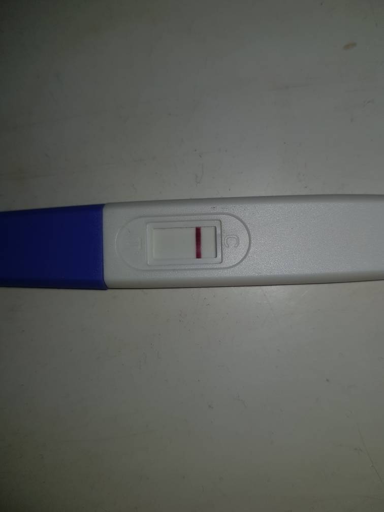 About 11 days late, cramps, white discharge, negative pregnancy tests.