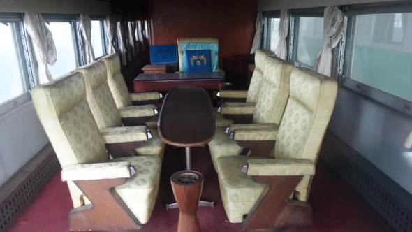 Conference table inside train carriage