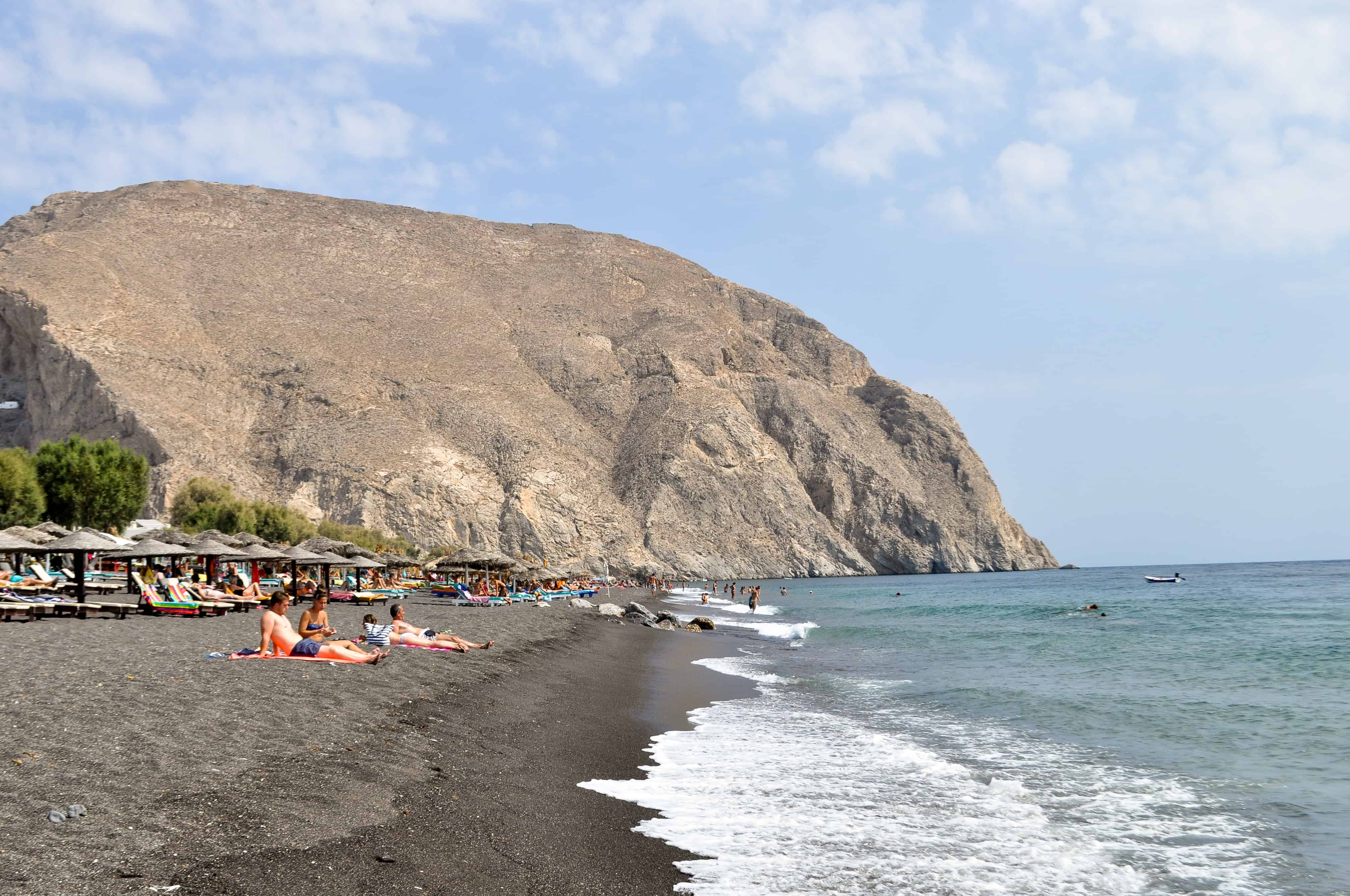 Perissa, Santorini Relax on the Black Sand Beach No Man Before