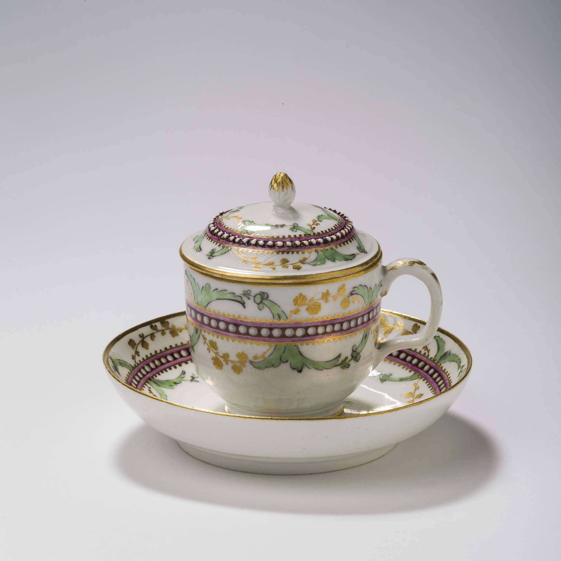 RUSSIAN PORCELAIN COVERED CUP AND SAUCER, THE IMPERIAL PORCELAIN