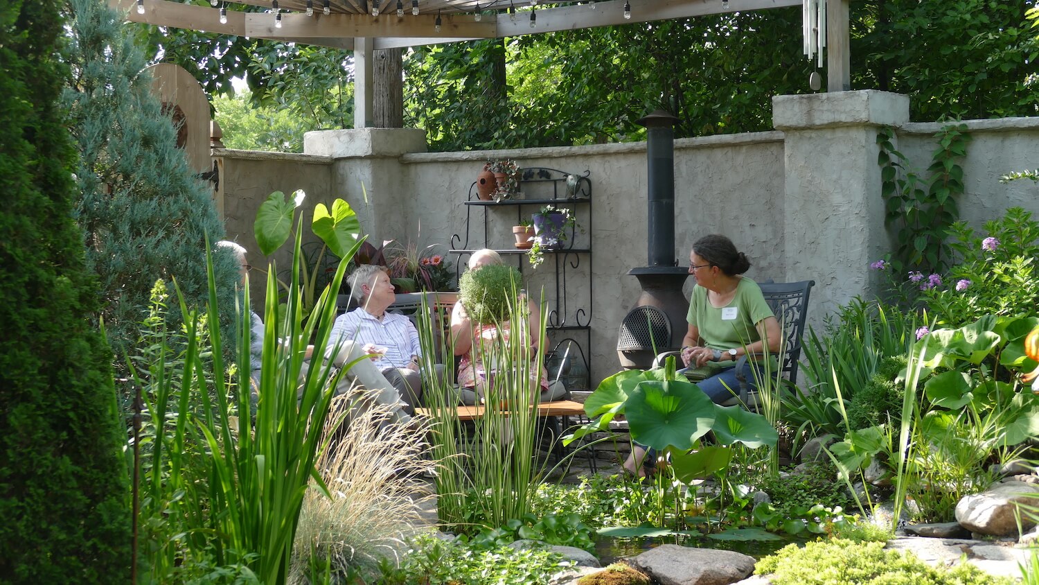 people talking in pergola