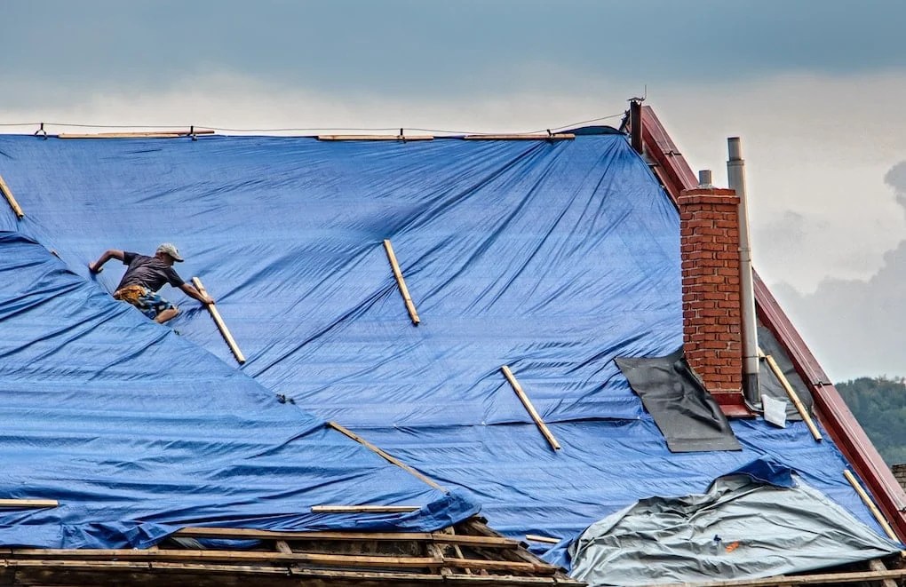 How To Tarp A Roof & Protect Your Home (2023 Guide)