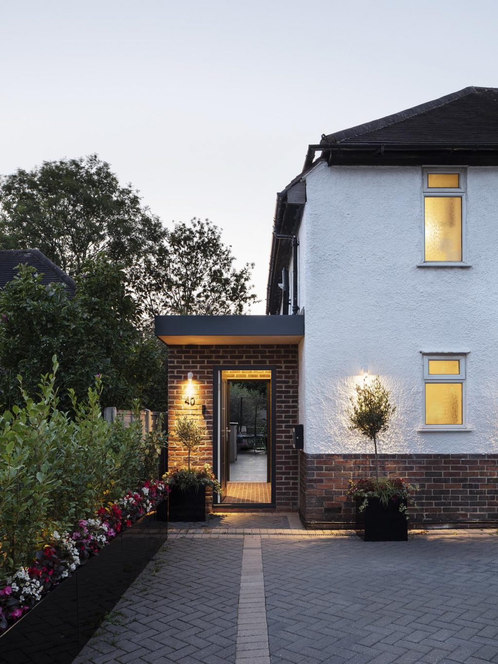 XXS Portico Extension by Brosh Architects