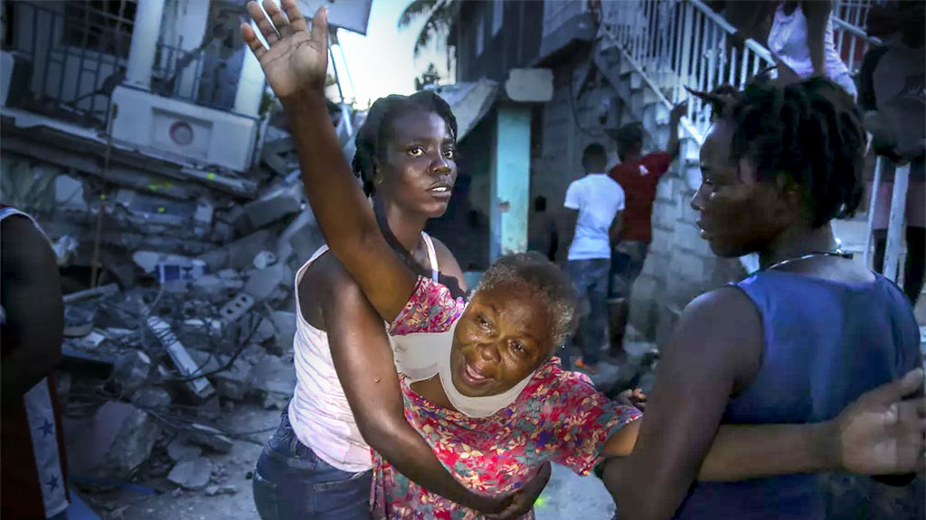 Número de mortos por terremoto no Haiti sobe para 1.297 ...