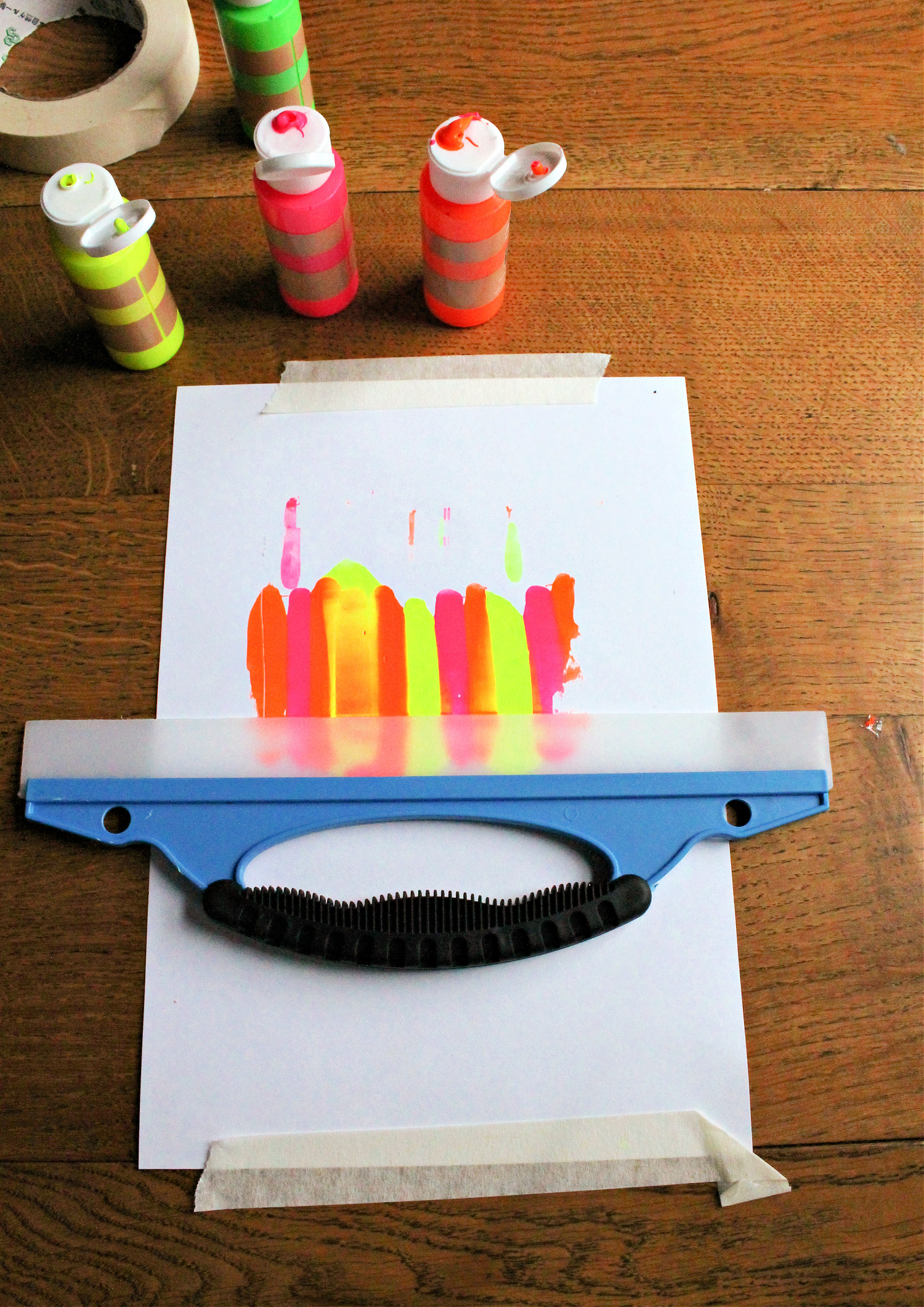 Squeegee painting process art activity NurtureStore