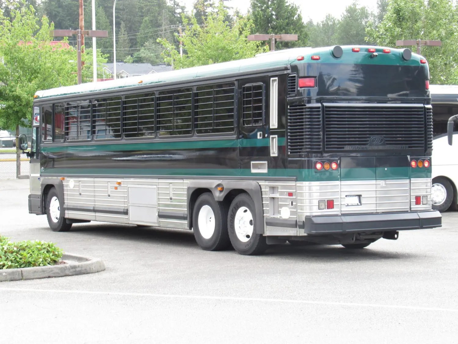 Northwest Bus Sales, Inc 2005 MCI D4000 Prison Bus 47 Inmates + 3