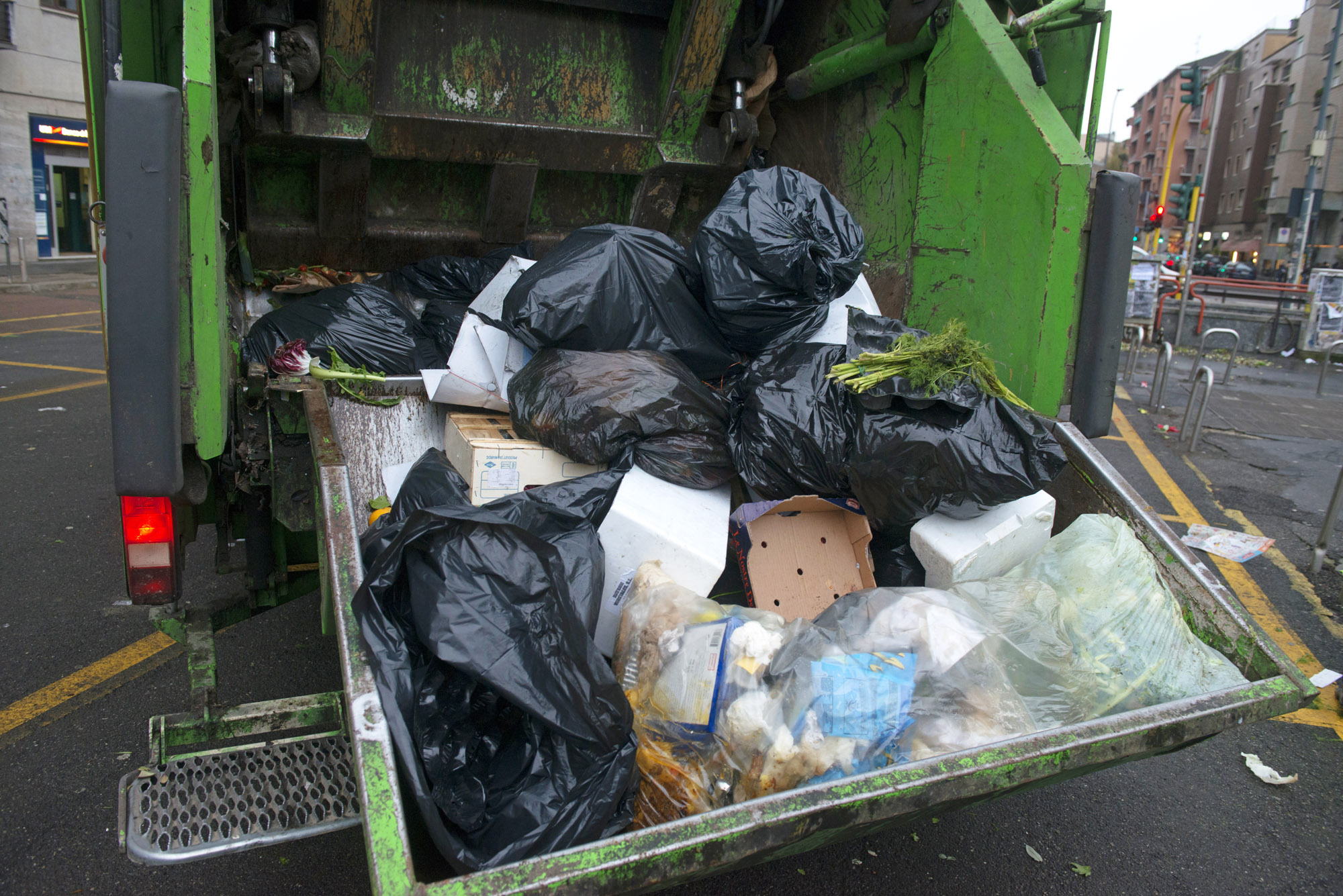 Man asleep in garbage bin survives trash compactor