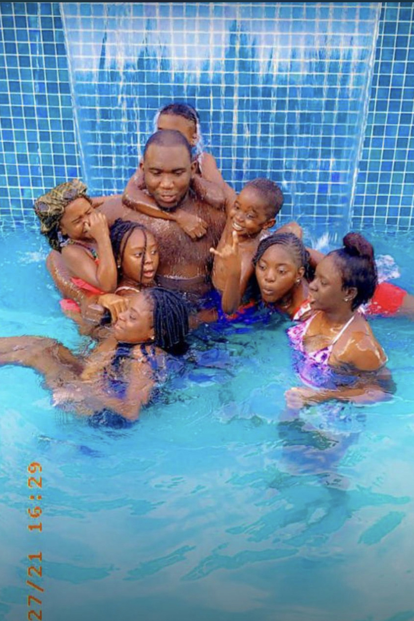 Stephen Stuart seen in a pool with his sister and cousins.