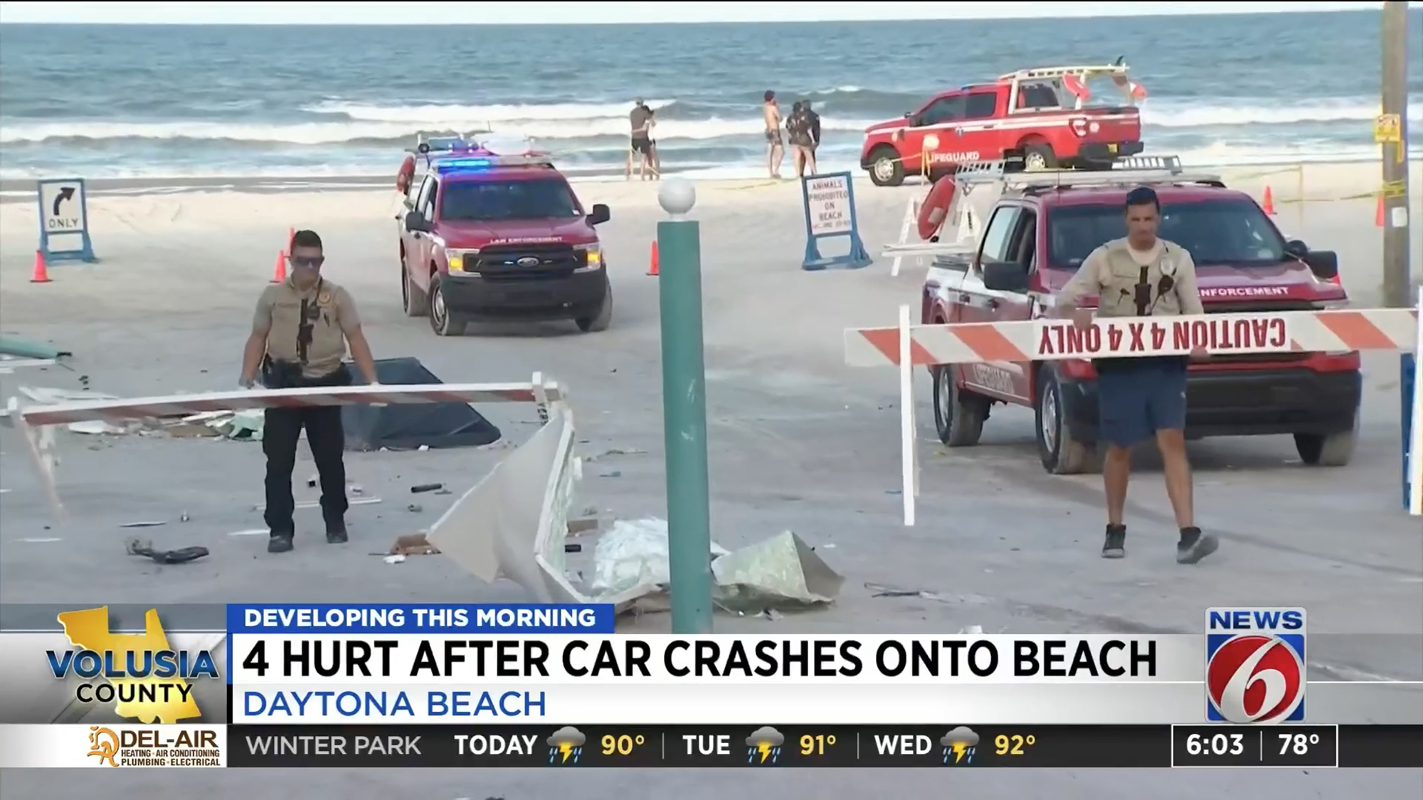 Car crashes through Florida toll booth, drives into ocean