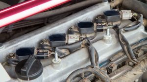 10 Symptoms of a Bad Ignition Coil (Replacement Cost in 2026)