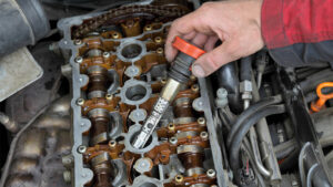 10 Symptoms of a Bad Ignition Coil (Replacement Cost in 2026)
